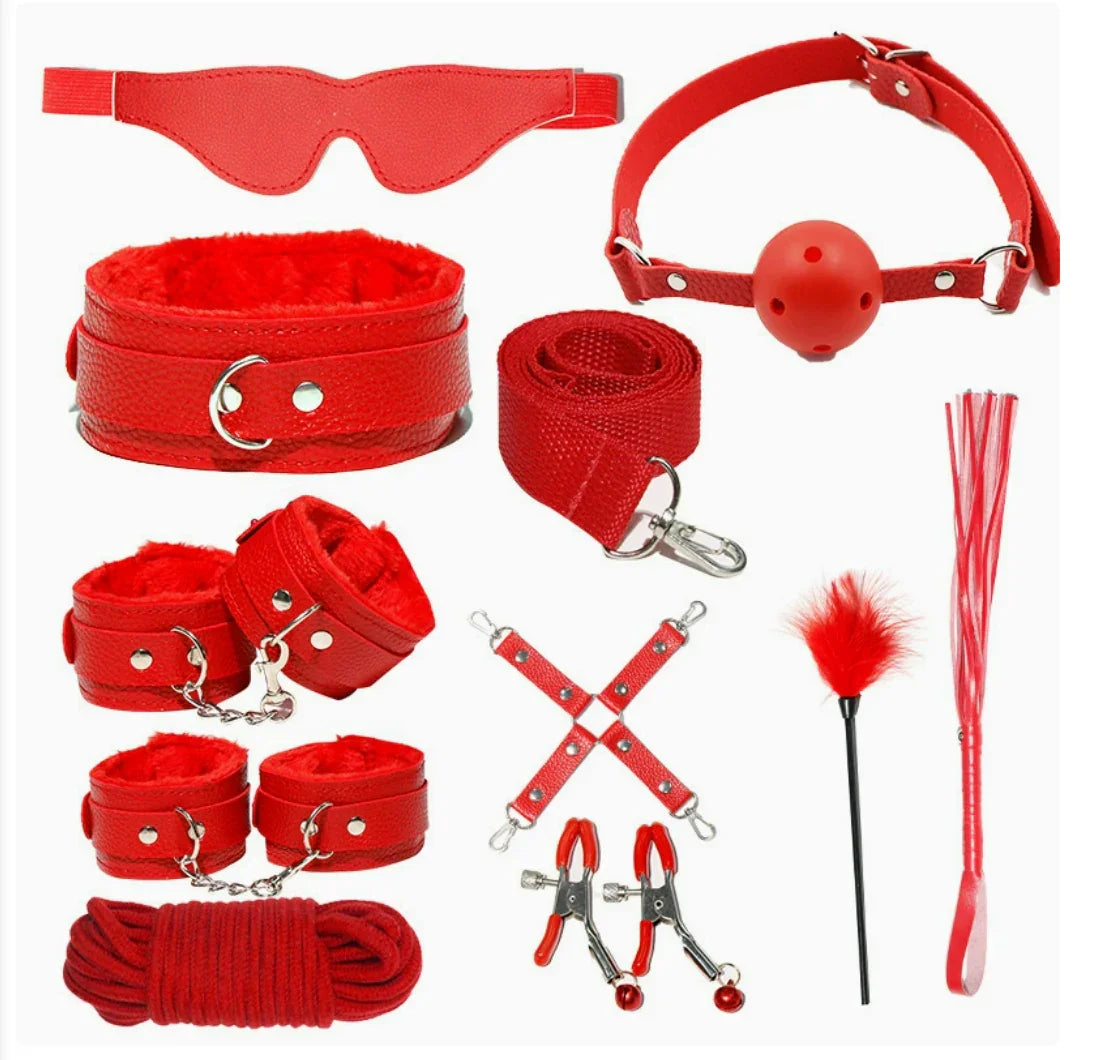 Red couples game kit with blindfold, collar, cuffs, ball gag, leash, rope, and playful accessories