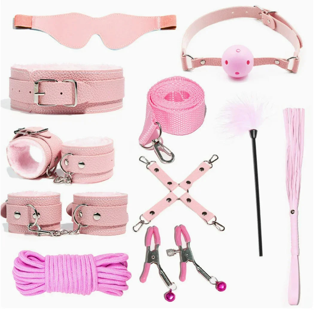 Pink couples game kit with blindfold, cuffs, collar, leash, feather tickler, and rope for excitement